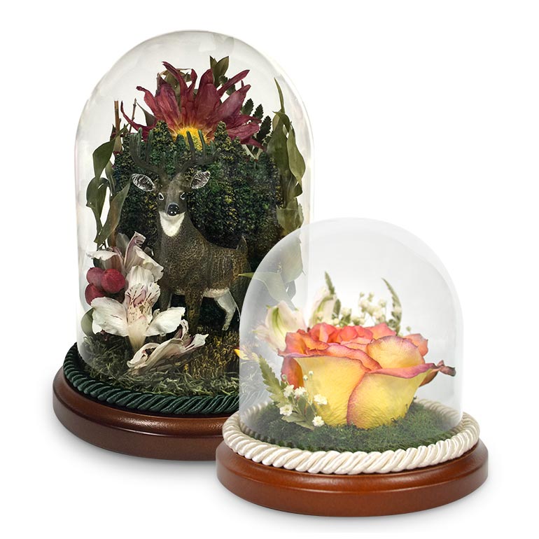 Flower preservation keepsakes in glass domes and other encasements.